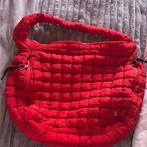 Vibrant Red Quilted Shoulder Bag with Crescent Shape